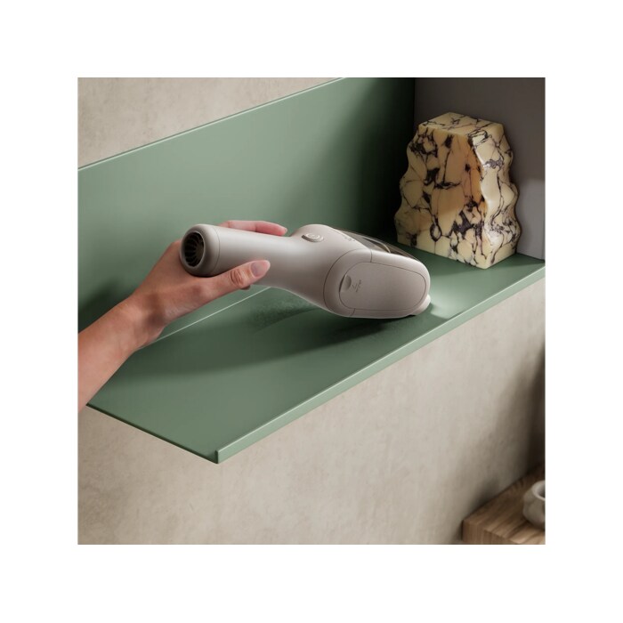 Product vacuuming fine dust on a shelf