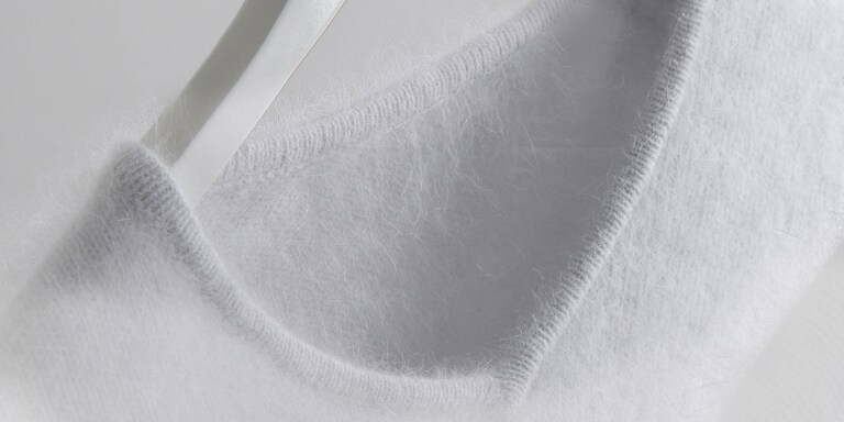 Bijeli vuneni džemper