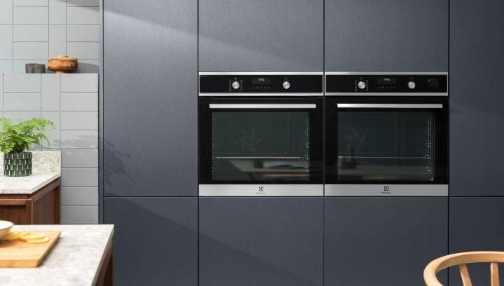 Two built-in Electrolux ovens in a stylish kitchen seamlessly blend into the decor 