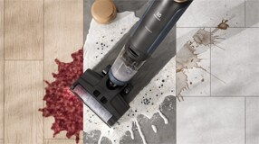 Man vacuuming carpet